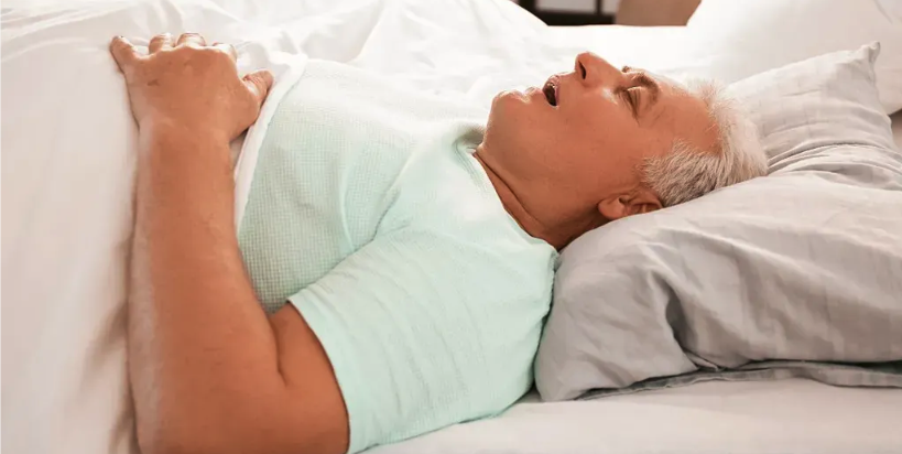 Person with sleep apnea symptoms